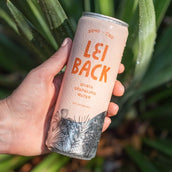 A can of Lei Back Guava Sparkling Water held in someone's hand